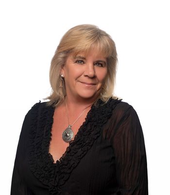 Portrait of Judy 'Jo' Overin, REALTOR®.